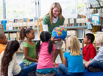 Teacher with children