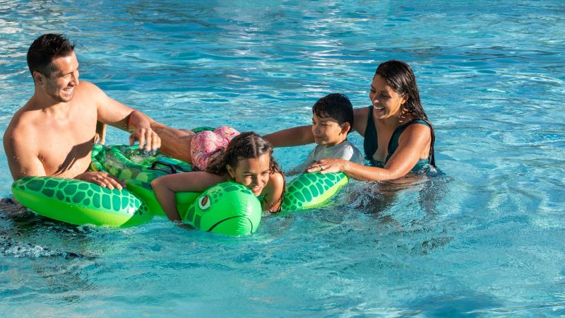 family in pool